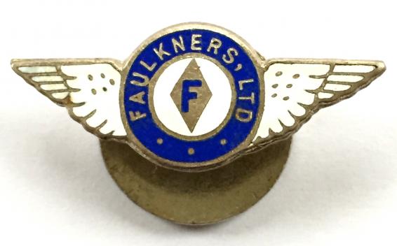 Faulkners Ltd Company Logo winged workers badge 
