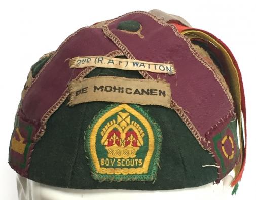 Kings Scouts collection of cloth badges sewn to a c1940s utility cap 