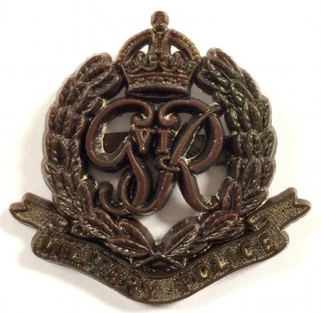 WW2 Military Police plastic economy issue cap badge