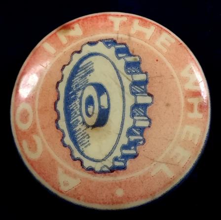 Junior Salvage A COG IN THE WHEEL tin button badge