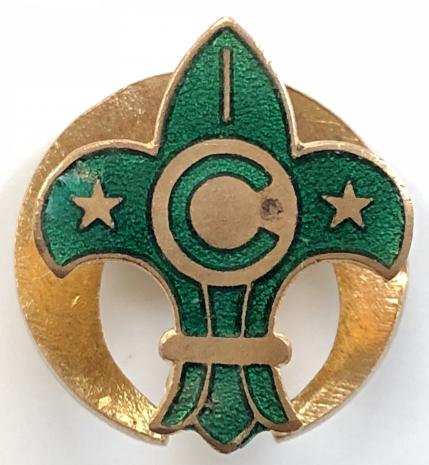 Boy Scouts Commissioner officer green enamel lapel badge.