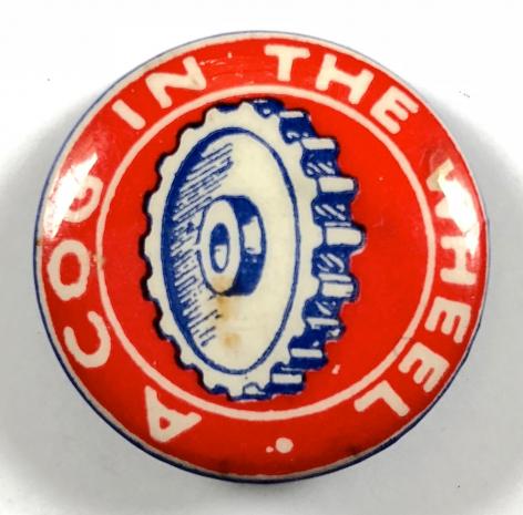 Junior Salvage A COG IN THE WHEEL tin button badge