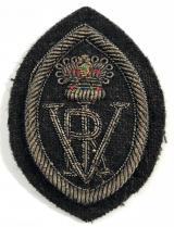 Queen's Institute of District Nursing silver bullion cloth hat badge