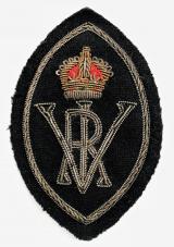Queen's Institute of District Nursing silver bullion cloth cloak badge