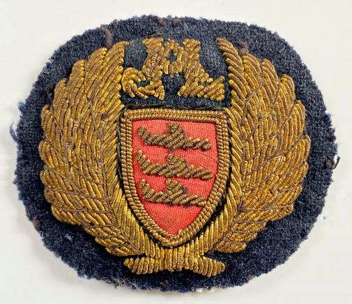Airlines Jersey Limited gold bullion felt cloth cap badge