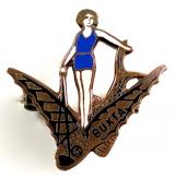 Bukta Swimwear bathing beauty poised on a flying fish promotional badge Art Deco c.1933 by Miller