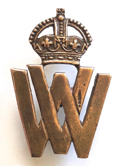 WW1 Volunteer War Workers officially numbered badge by J.R.Gaunt