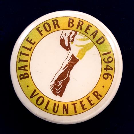 1946 Battle For Bread Volunteer celluloid tin button badge