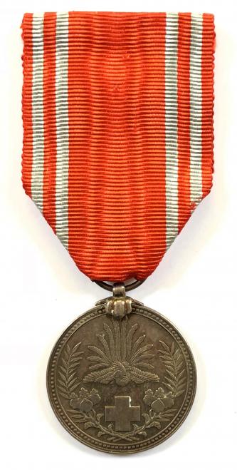 Japanese Red Cross Society silver medal and bow lapel circa pre 1941