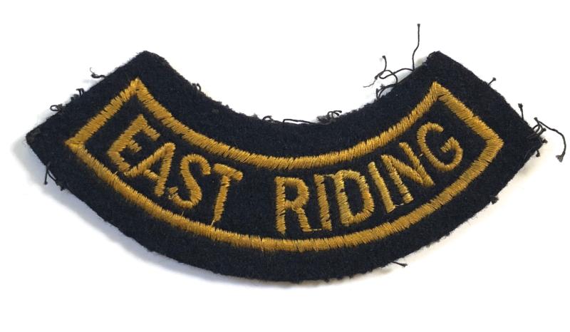 WW2 Civil Defence Corps East Riding area curved title cloth badge