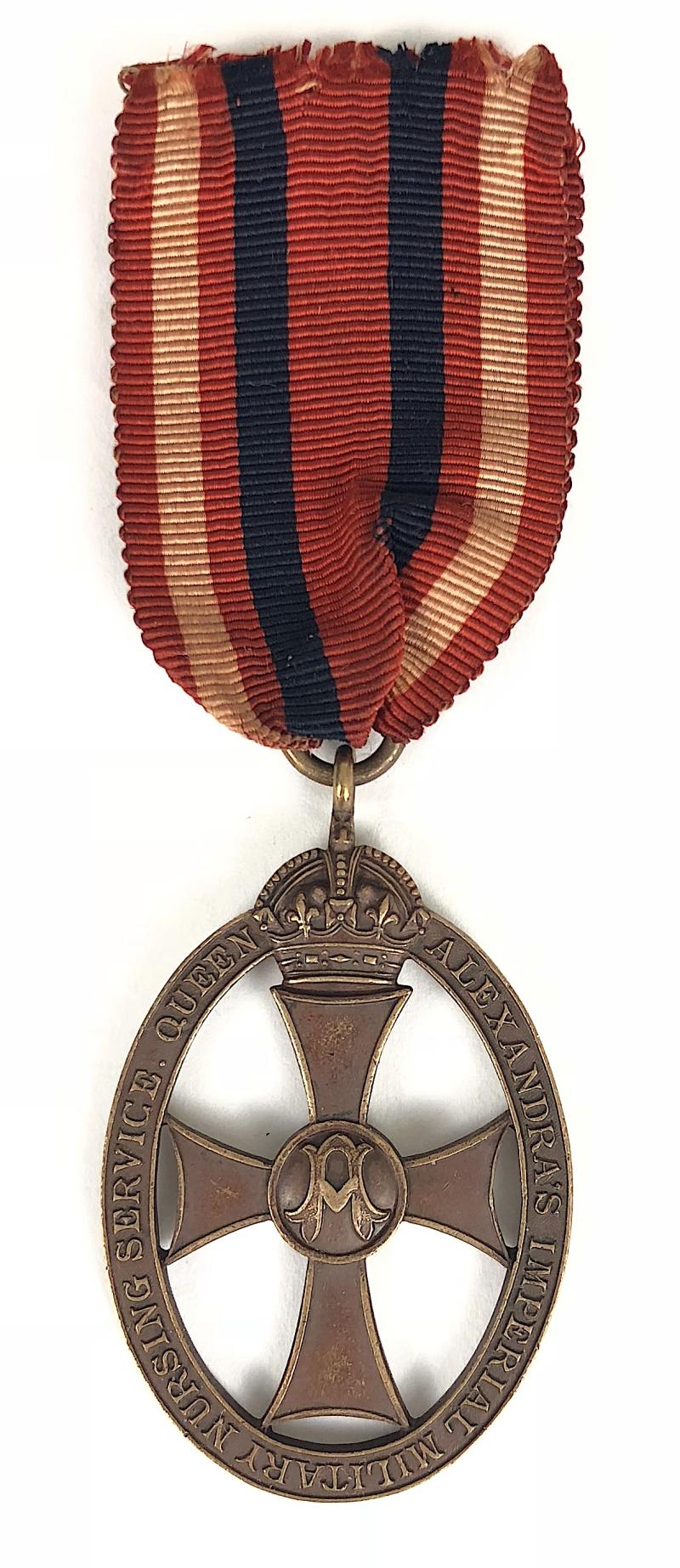 Queen Alexandras Imperial Military Nursing Service male nurse medal & SRN named badge