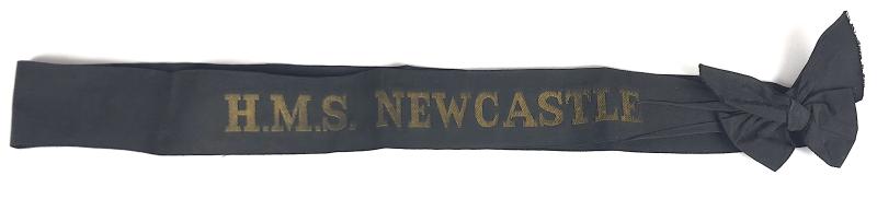 Royal Navy H.M.S. Newcastle cap tally tied in a bow c.1936 - 1958