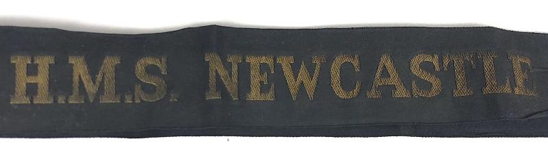 Royal Navy H.M.S. Newcastle cap tally tied in a bow c.1936 - 1958