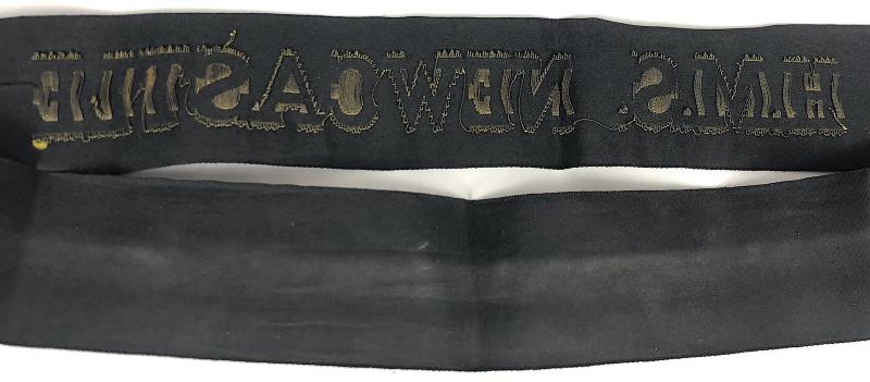 Royal Navy H.M.S. Newcastle cap tally tied in a bow c.1936 - 1958